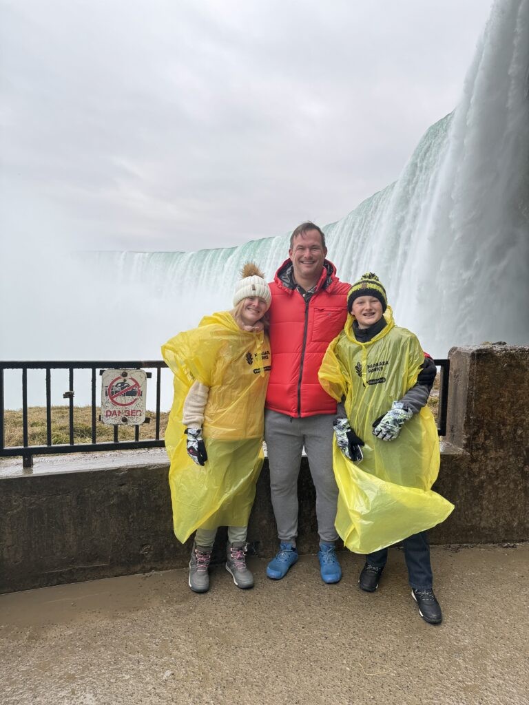 Robert with Kenley and Braden beside Niagara Falls